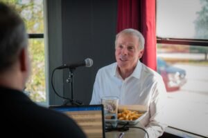 Dave Rauschkolb, owner of Bud & Allie's in Seaside which Dave describes as "the center of the center of the universe" and Black Bear Bread Company